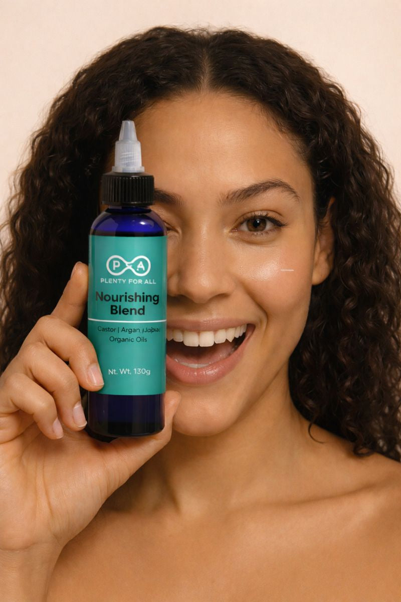 woman with healthy natural hair using PlentyForAll hair oi